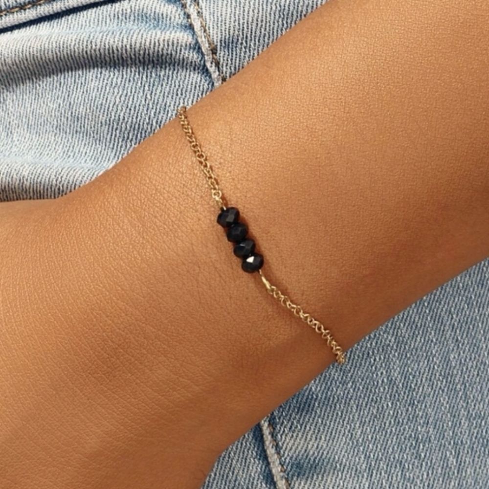 - Dainty gold beaded bracelet